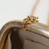 Secondhand Chanel Logo CC Gold Leather Bag