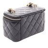 Chanel Quilted Lambskin Vanity Case with Pearl Chain Secondhand