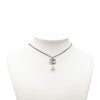 Chanel Brass Faux Pearl and Strass Twisted CC Pendant Necklace Secondhand
