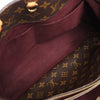 Louis Vuitton Montaigne GM Monogram Canvas Handbag in Brown Secondhand