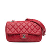 Chanel Medium Perforated Lambskin Punch Flap Secondhand