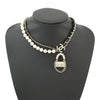 Chanel Gold Plated Chain And Faux Pearl Flap Bag Pendant Necklace Secondhand