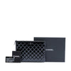 Chanel Medium Quilted Patent O Case Clutch Secondhand