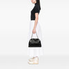 Chanel Large Quilted Patent Just Mademoiselle Bowling Bag Secondhand