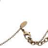 Chanel CC Gold Plated Striped Resin Strass Round Pendant Necklace Secondhand