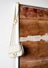 Curated vintage designer handbags by Miu Miu, Hermès and Chanel from Her-Age’s authenticated pre-owned luxury archive.