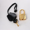 Celine Macadam PVC & Leather Boston Travel bag in Black × Brown Secondhand