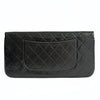 Chanel Clutch handbag in matelassé black leather