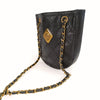 Chanel vintage shoulder bag in black quilted leather