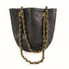 Chanel vintage shoulder bag in black quilted leather