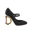 Dolce & Gabbana Cloth x Glitter DG logo Mary Jane Heels Baroque in Black, Size 36 EU Secondhand