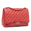 Chanel Maxi Classic Patent Double Flap Secondhand