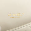 Chanel Quilted Lambskin and Shearling CC Muff Flap Secondhand