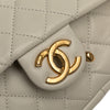 Chanel Quilted Lambskin and Shearling CC Muff Flap Secondhand