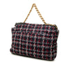 Chanel Maxi Tweed 19 Flap Secondhand