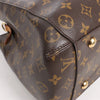 Louis Vuitton Montaigne GM Monogram Canvas Handbag in Brown Secondhand