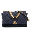Chanel Maxi Canvas 19 Flap Secondhand