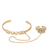 Chanel CC Gold Plated Rhinestone Logo Cuff Bracelet and Ring Set Secondhand