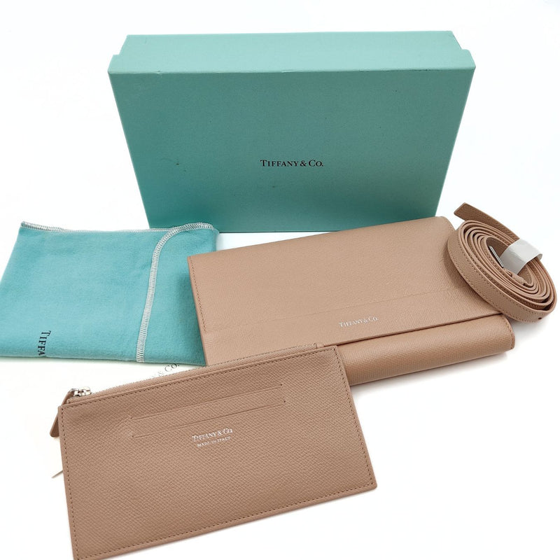 Tiffany & Co. wallet with shoulder strap in beige leather