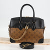 Louis Vuitton City Malle Handbag Reverse Monogram Canvas and Leather