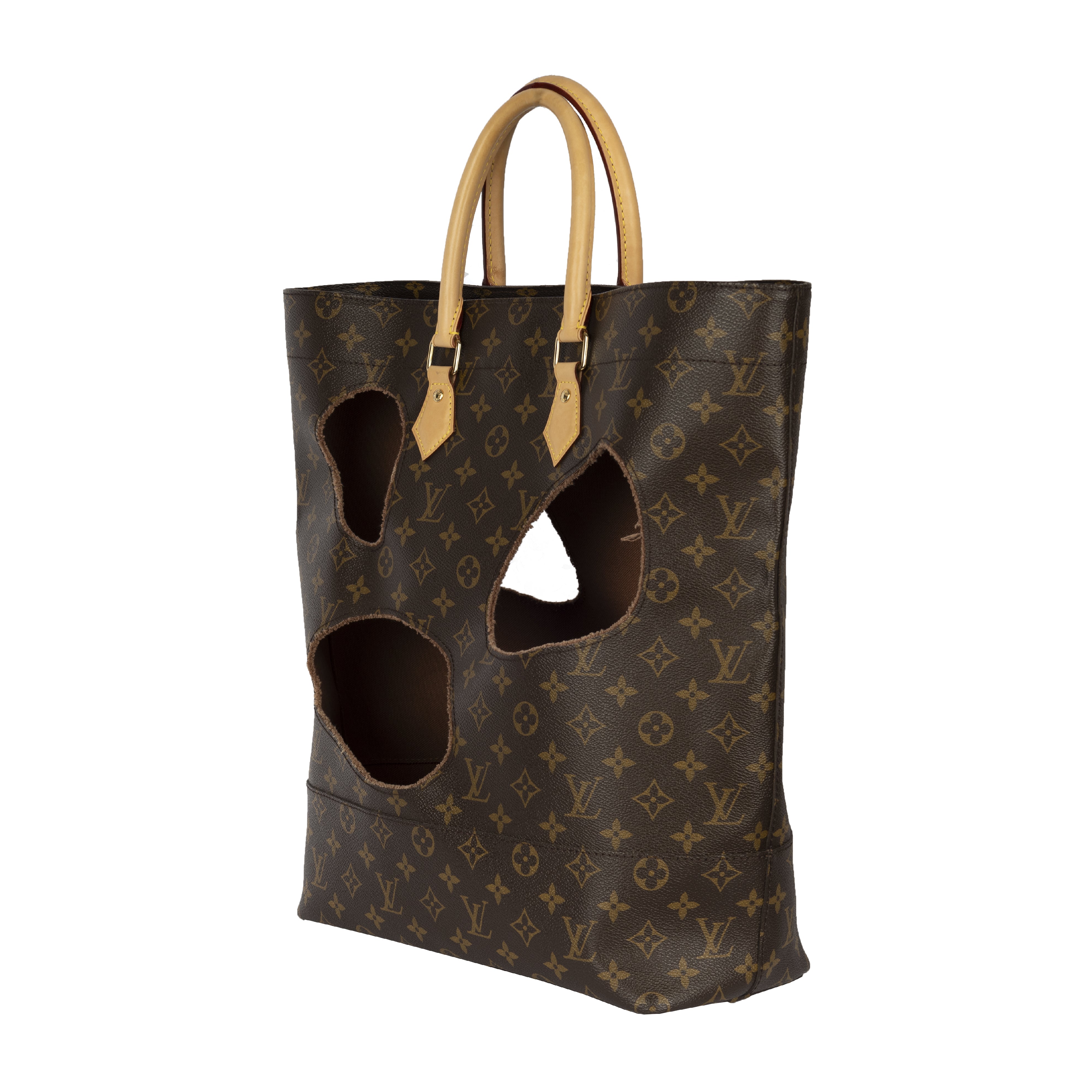This Louis Vuitton Monogram Tote Comes With Holes Burned Into It