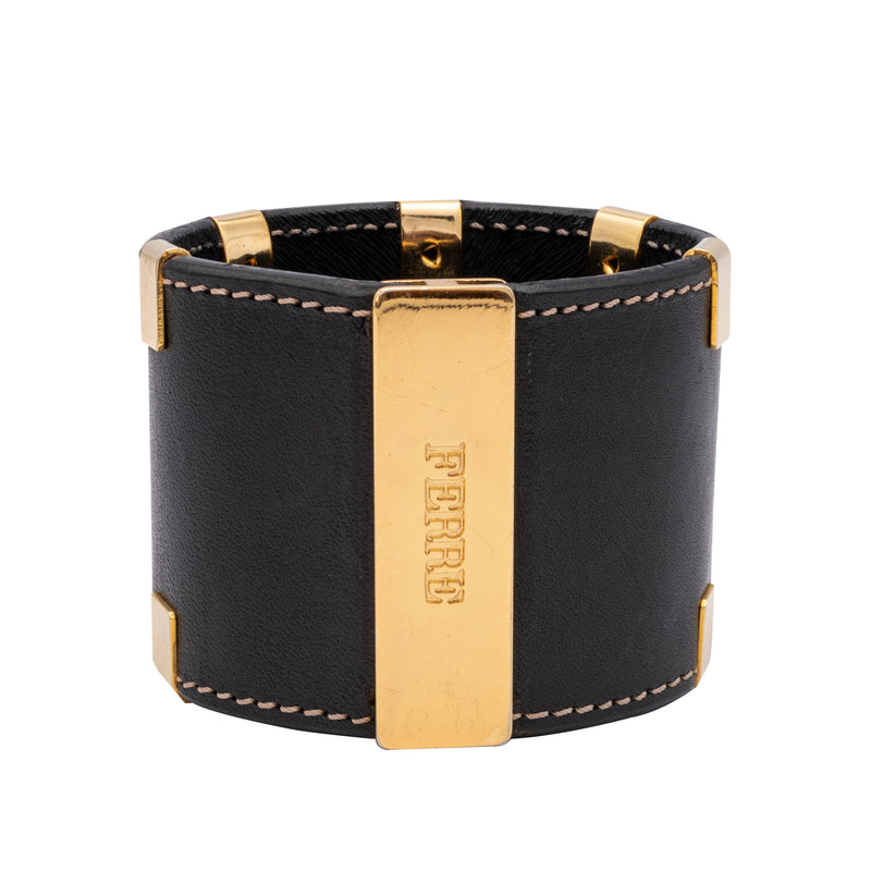 Gianfranco Ferré black leather bracelet. Rigid style with golden inserts pre-owned